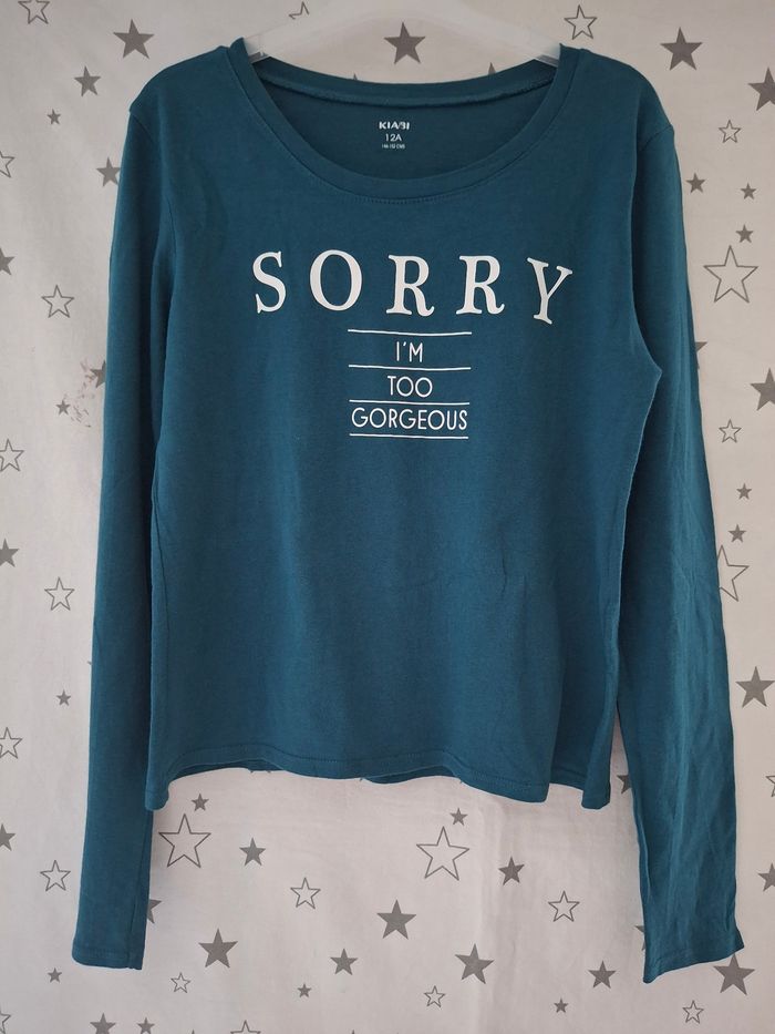 Tee-shirt bleu roi avec Inscription Sorry 12 ans Kiabi
Très bon état ni trous ni tache - photo numéro 2