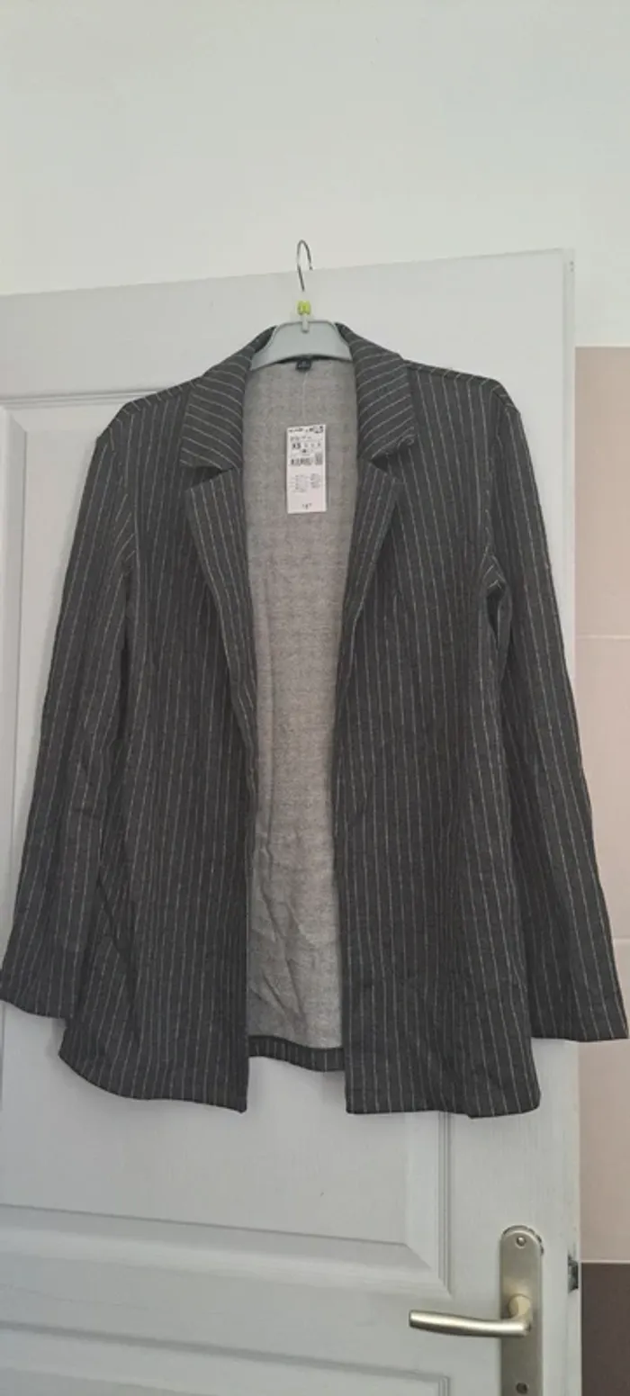 Veste fine taille XS neuve