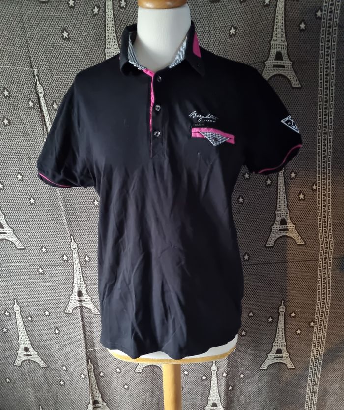 Polo noir et fuchsia taille M