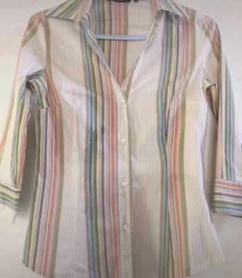 Très jolie chemise Zara Stretch, se porte près du corps. Agréable à porter .Taille M.