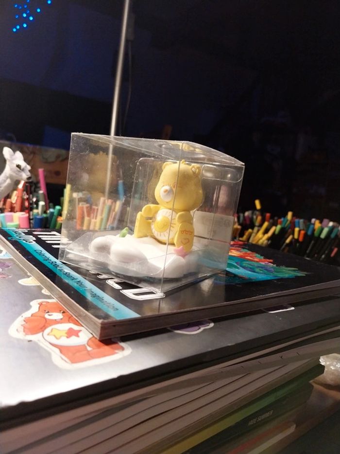 Support de téléphone bisounours care bears jaune