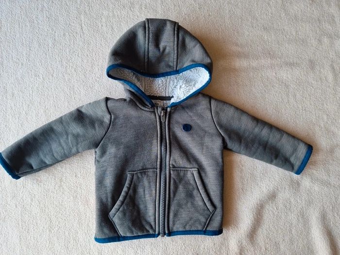 Veste rembouree ikks 12 mois