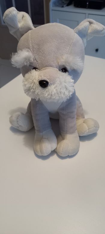 Peluche chien assis