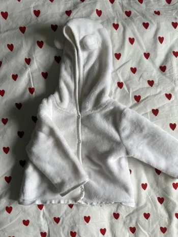 Veste fourrure blanche oreille de petit ours