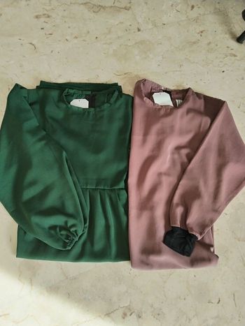 2 Abayas  neuves Dar Al Iman 6/7ans