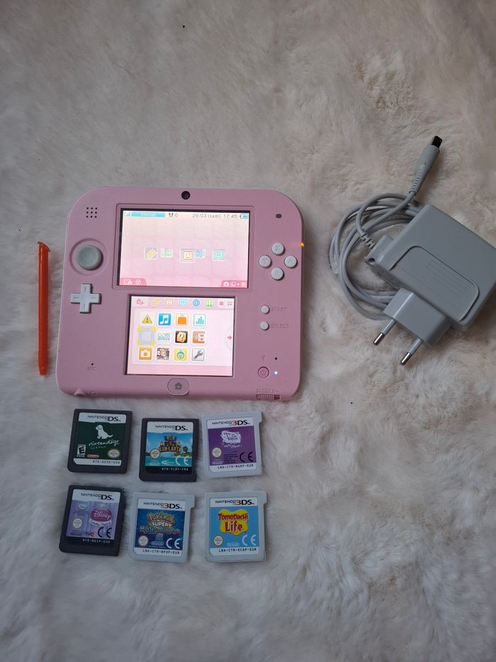 Nintendo 2ds rose + 6 jeux