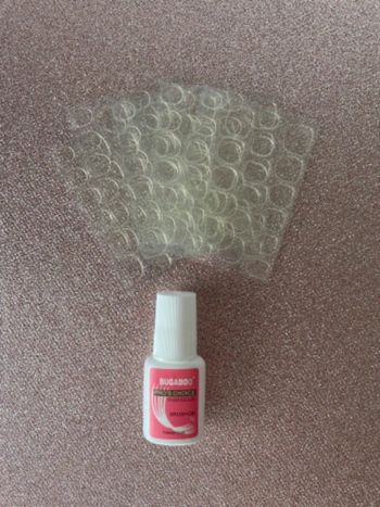 Colle à faux ongles + 5x feuilles de gel pads