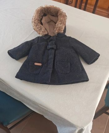 Manteau  liseré doré