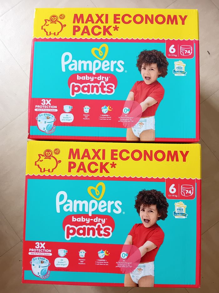 2 pampers maxi economy pack T6 pants.