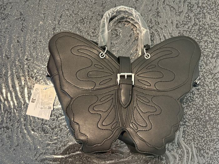 Sac noir papillon