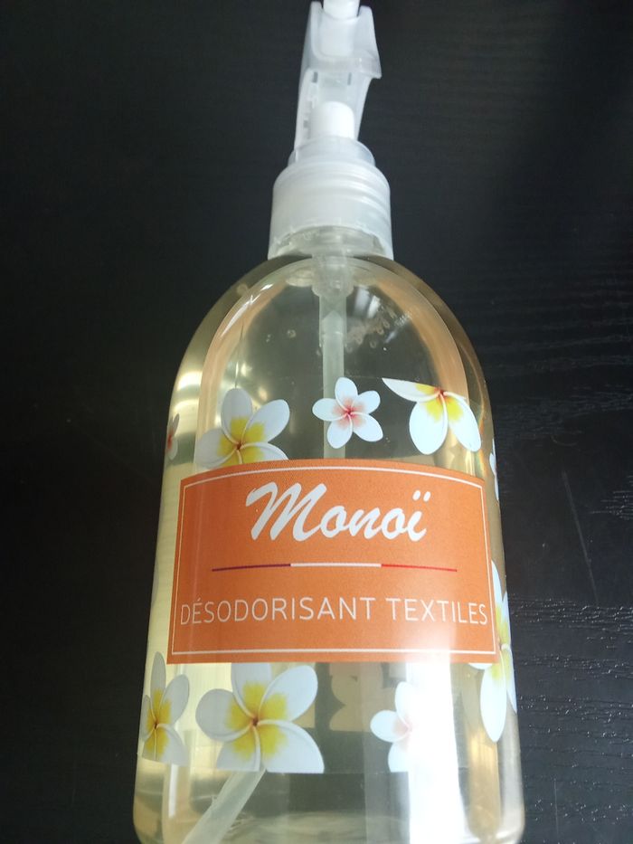 Spray textile monoï