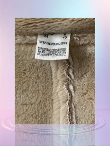 Manteau fausse fourrure