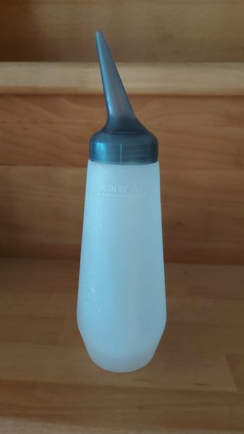 Biberon doseur applicateur