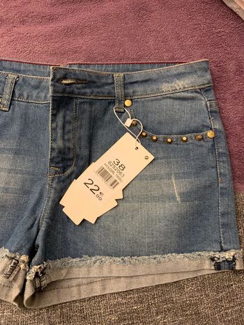 Short en jeans poches cloutées taille 38