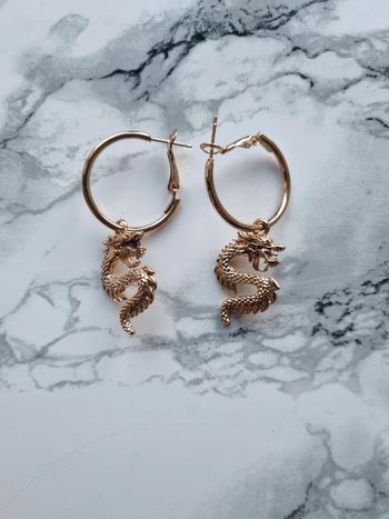 Boucle d'oreille dragon doré