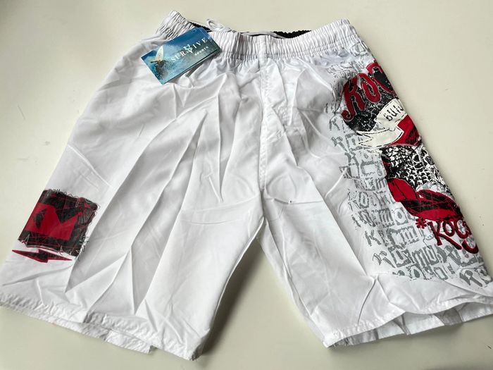 Short de bain blanc taille 14 ans