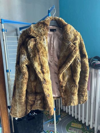 Manteau fourrure H&M taille S en très bon état