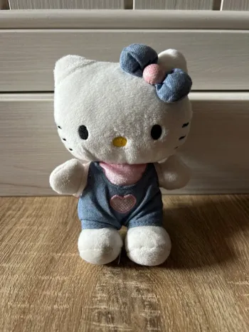 Peluche Hello Kitty salopette bleu avec sac à dos / Sanrio / version plus rare car sac