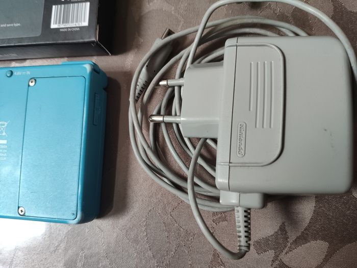 Nintendo DSi bleu avec 10 000 jeux - photo numéro 3