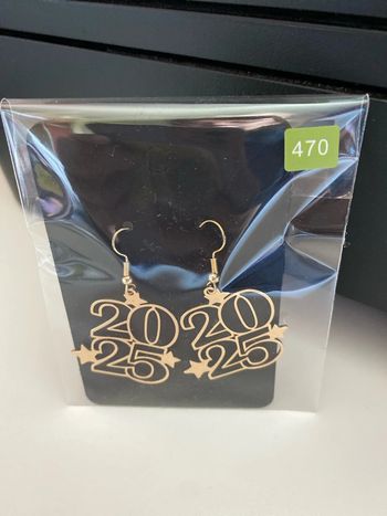 Boucles d’oreilles dorées année 2025