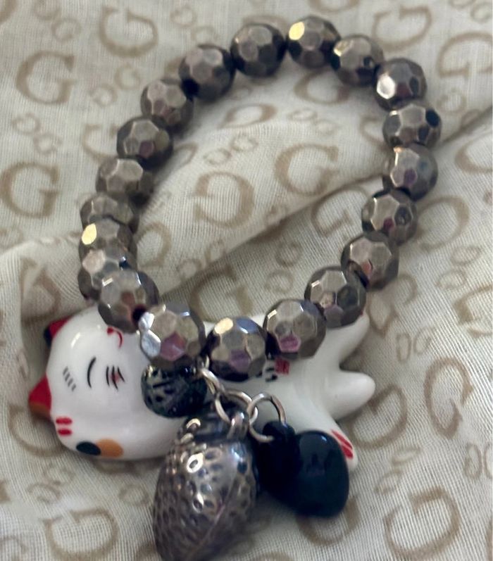 Bracelet perles anthracite avec breloques - photo numéro 2