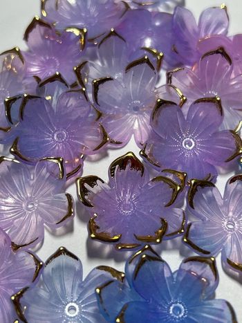 B64, 28 perles fleurs 23mm