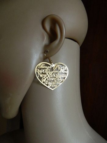 Boucles d'oreilles coeur doré neufs