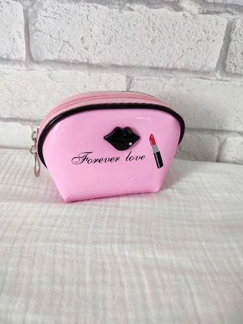 Porte-monnaie rose et noir