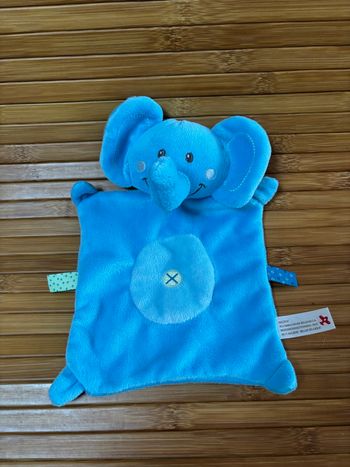 Doudou plat éléphant bleu étiquettes nicotoy 