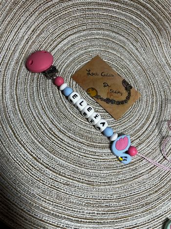 Attache tétine cygne