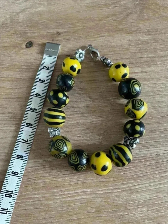 Bracelet jaune et noir à pois et rayure - photo numéro 3