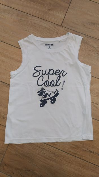 Tee shirt sans manche garçon 8 A