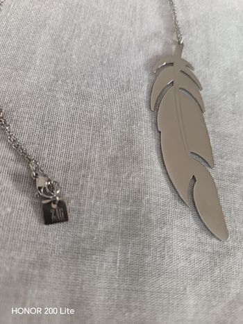 Collier plume argenté