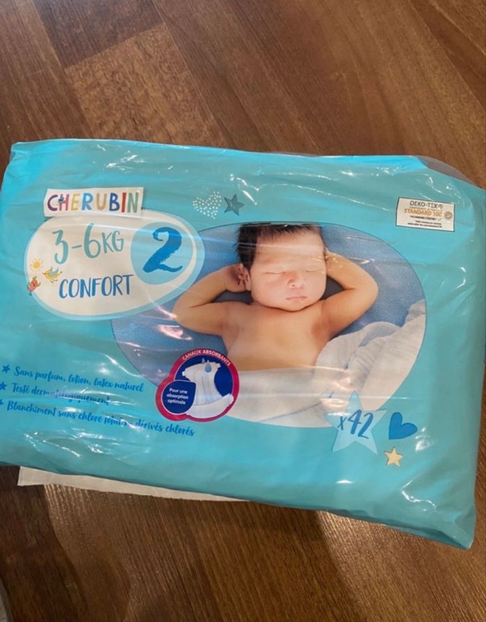 Lot 58 couches taille 2 (3-6kg) carryboo chérubin - photo numéro 4