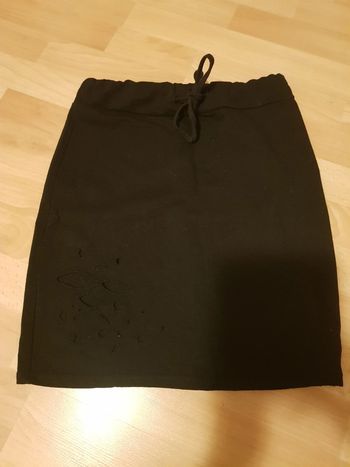 Mini jupe effet troué