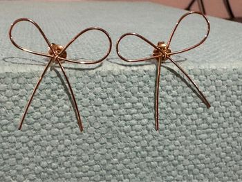 Boucles d’oreilles gros noeud fils acier inoxydable or