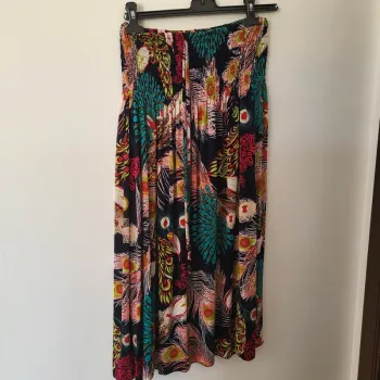 Robe ou longues jupe motifs plumes taille unique