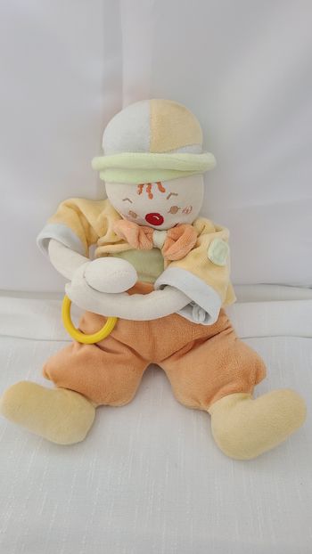 Doudou Clown Orange Vert Anneau Grelot SUCRE D’ORGE