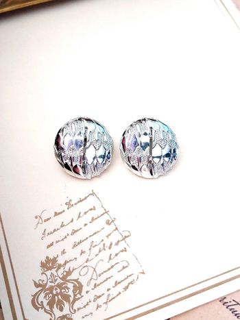 Magnifique paire de boucles d'oreilles à clip vintage