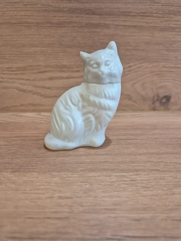 Flacon de parfum Avon chat
