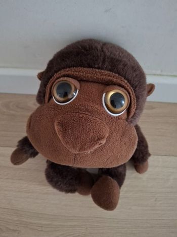 Singe en peluche en très bon état