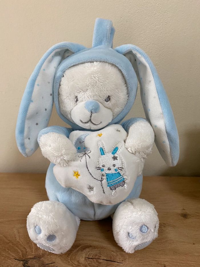 Doudou peluche ours déguisé en lapin bleu blanc étoiles musical max et sax - photo numéro 2