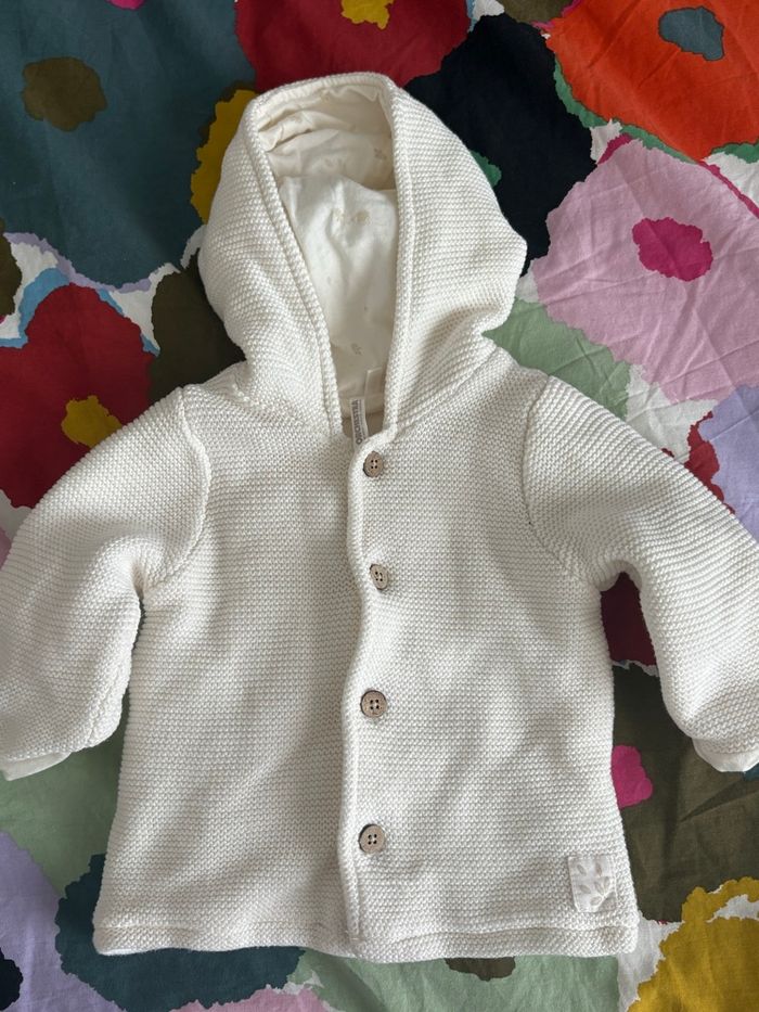 Gilet épais à capuche