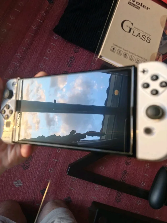 Nintendo Switch OLED 64Go + 128 Blanc Avec son lot d'accessoires - photo numéro 6