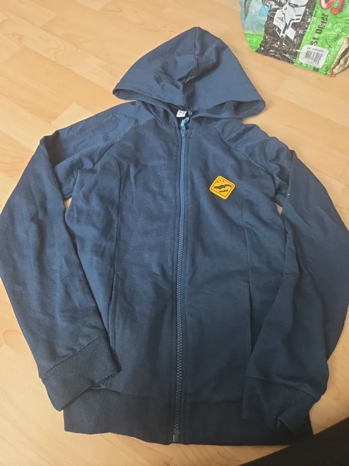 Gilet zippé 11.12ans