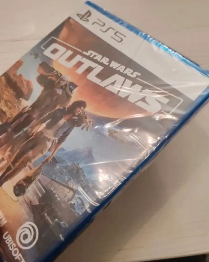 Star Wars Outlaws ps5 sous cellophane d'origine - photo numéro 3