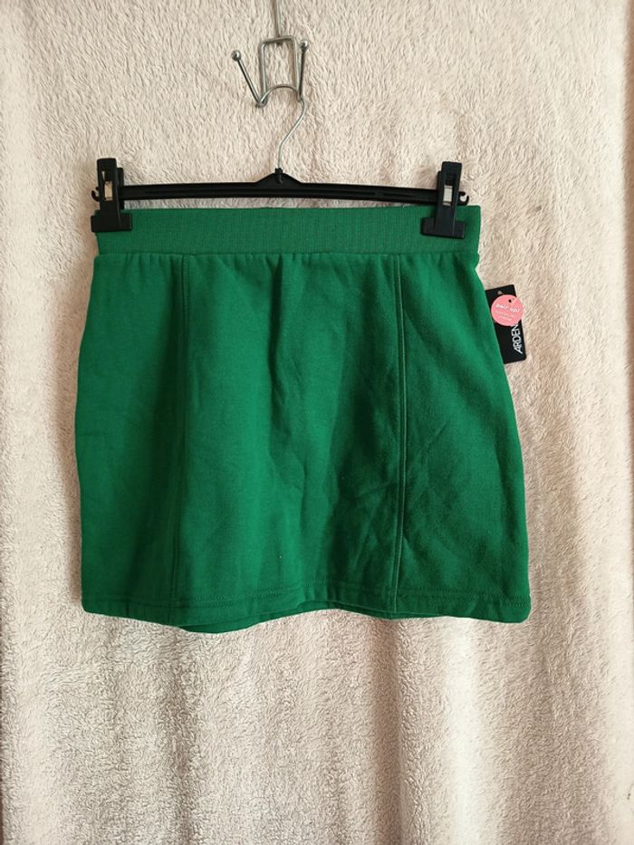 Mini jupe polaire. Marque Ardene (A363)