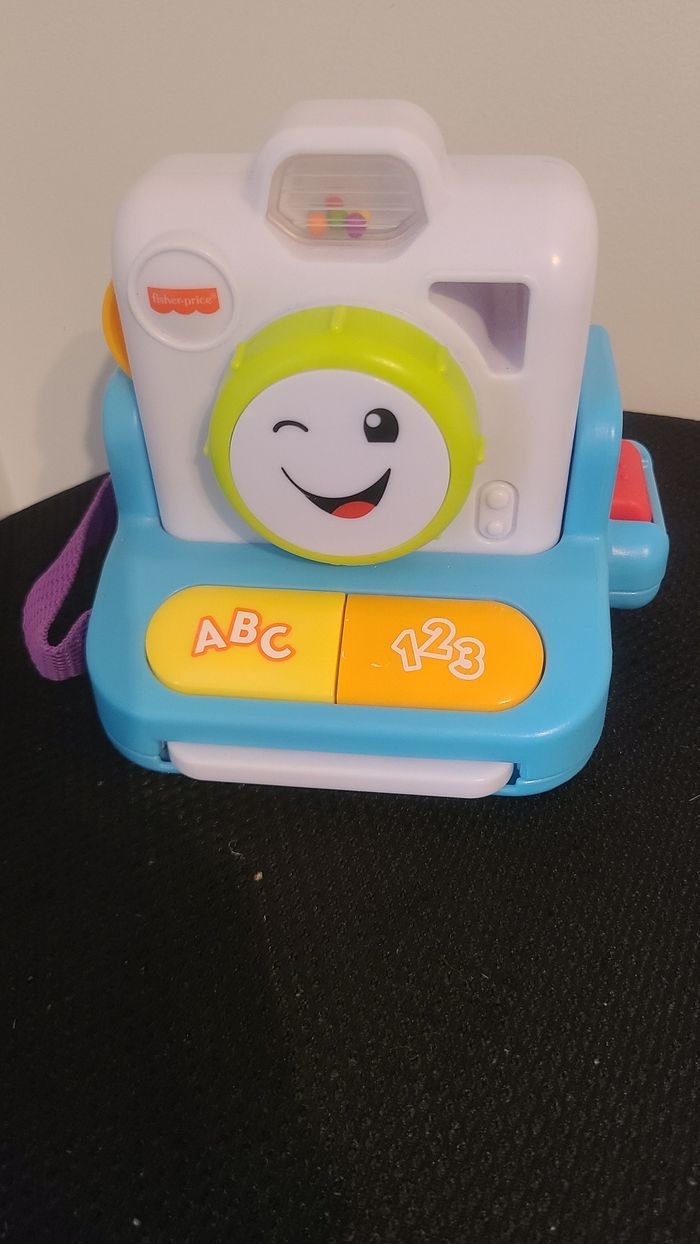Fisher-Price Rires et Éveil Mon Premier Appareil Photo instantané, Jouet Musical - photo numéro 2