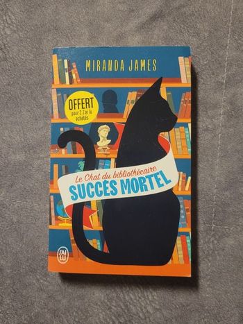 Le chat du bibliothécaire Succès Mortel