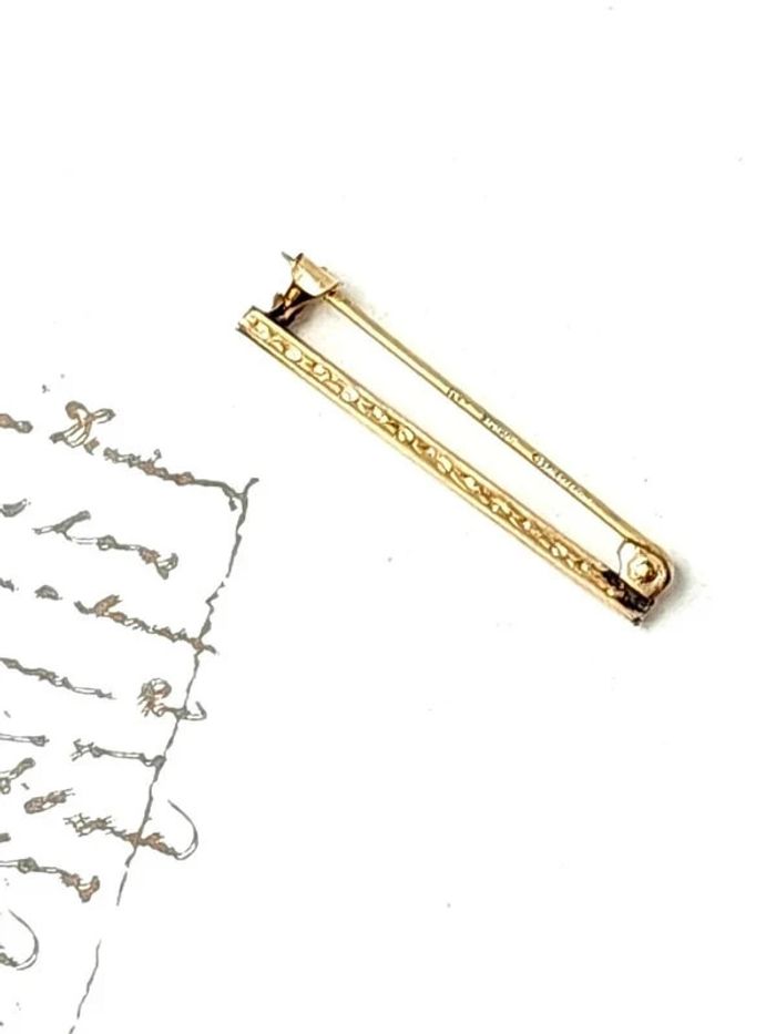 Broche vintage plaqué or épingle cravate